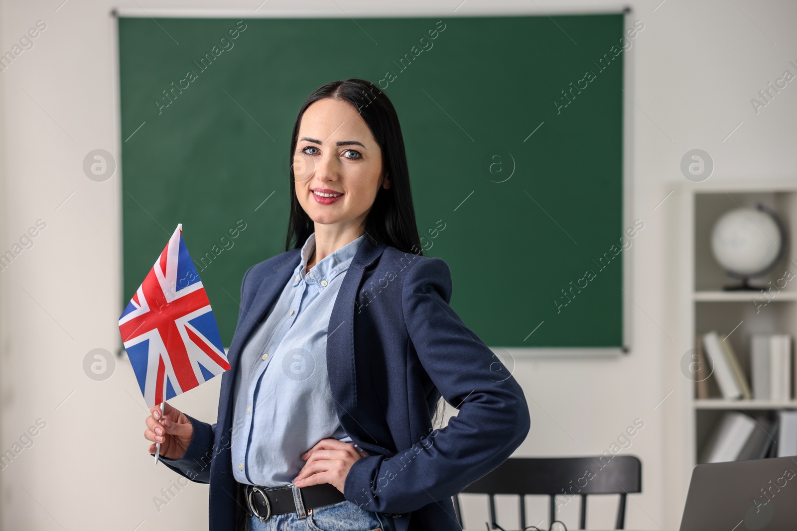 Photo of English teacher with UK flag in classroom