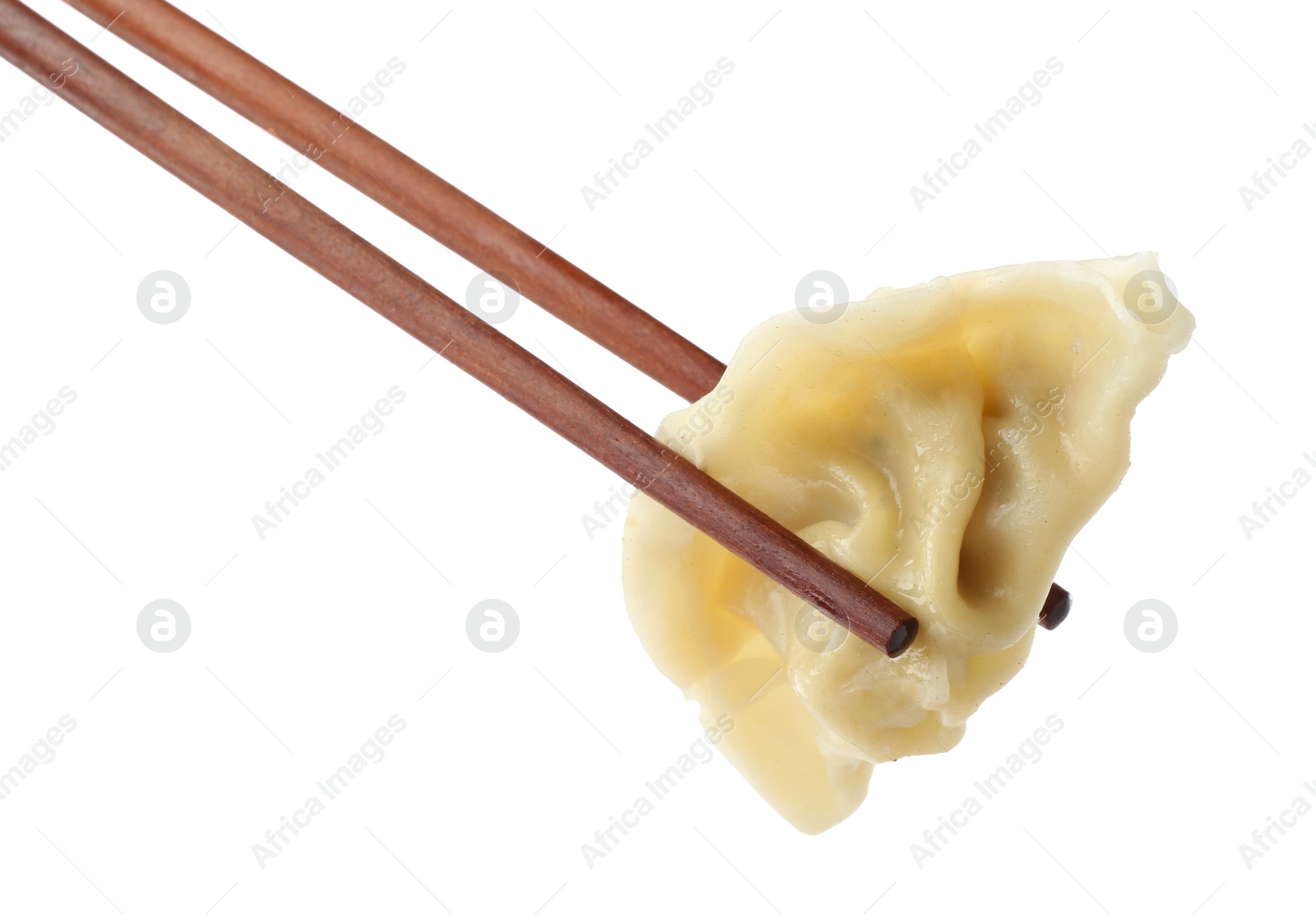 Photo of Chopsticks with tasty boiled gyoza (dumpling) on white background