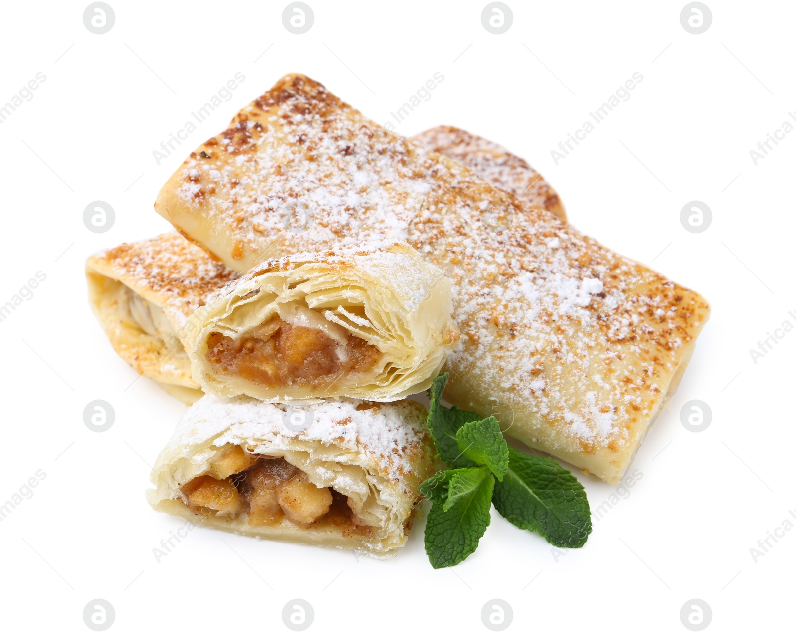 Photo of Tasty apple strudels with powdered sugar and mint isolated on white