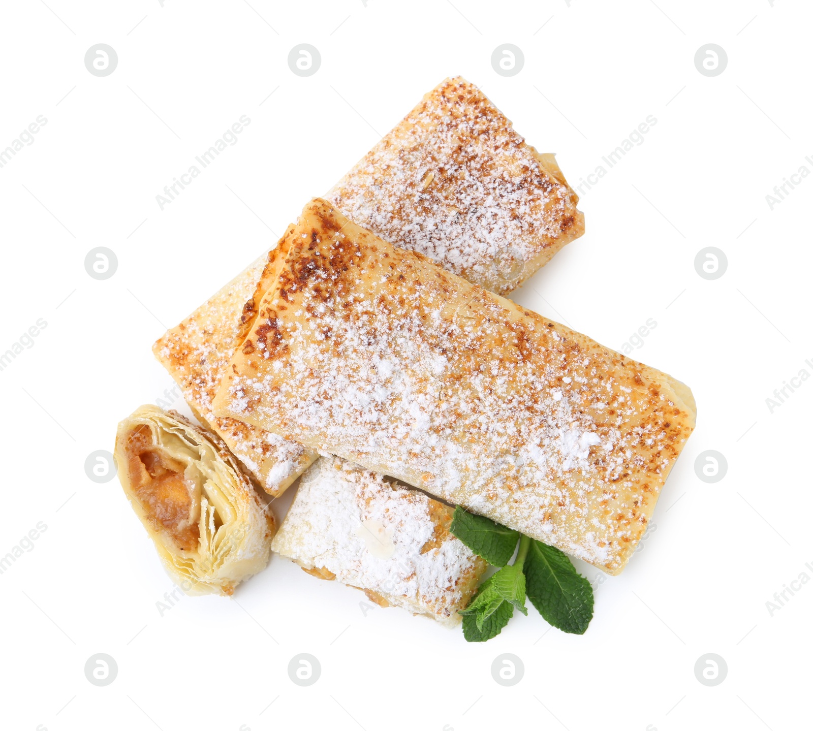 Photo of Tasty apple strudels with powdered sugar and mint isolated on white, top view