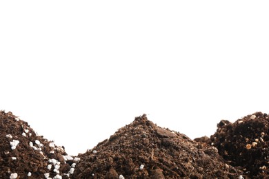 Photo of Piles of fresh soil isolated on white