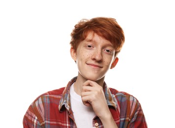 Photo of Portrait of cute teenage boy with freckles on white background