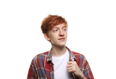 Cute teenage boy with freckles on white background