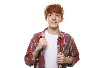 Photo of Portrait of smiling teenage boy with freckles on white background