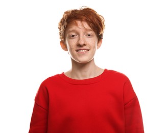 Photo of Portrait of smiling teenage boy with freckles on white background