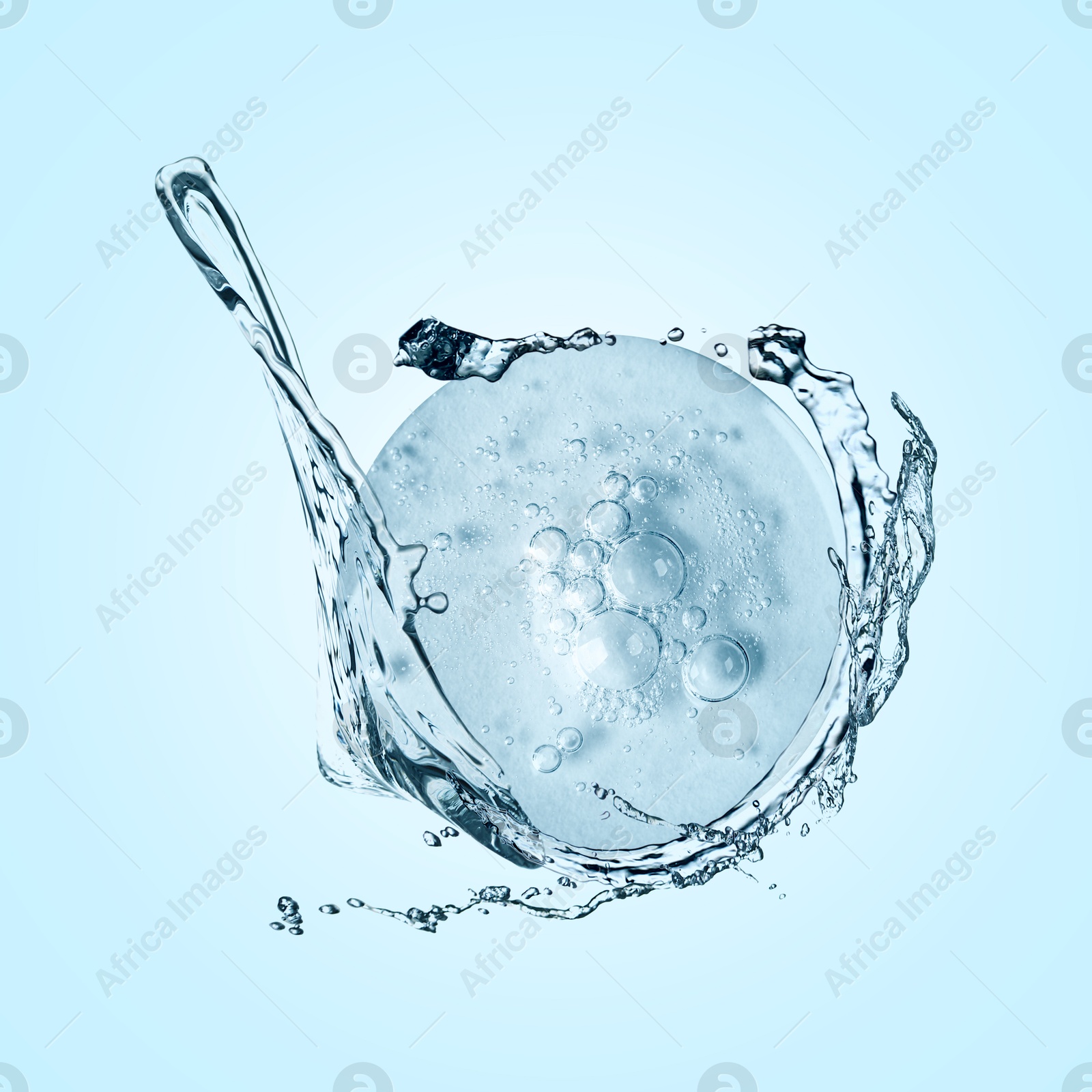 Drop of cosmetic serum and splashing water on light blue background Image of Drop of cosmetic serum and splashing water on light blue background