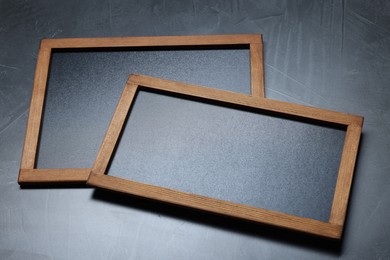 Photo of Blank small blackboards on dark gray textured background