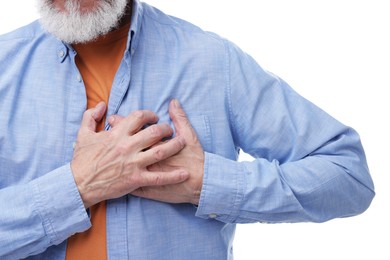 Heart attack. Senior man suffering from pain in chest on white background, closeup