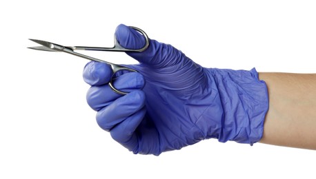 Photo of Doctor in medical glove holding scissors on white background, closeup