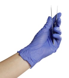 Photo of Doctor in medical glove holding tweezers on white background, closeup