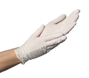 Photo of Doctor putting on medical gloves against white background, closeup