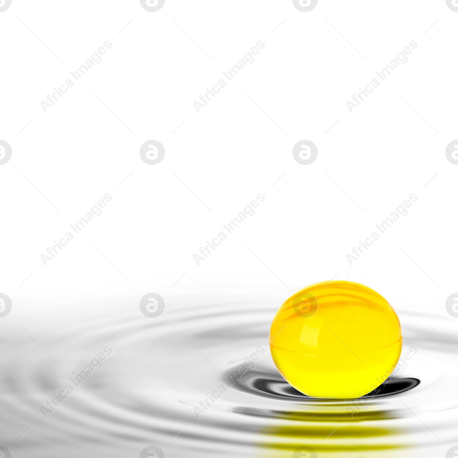 Image of Fish oil capsule in water on white background. Omega-3 fatty acids