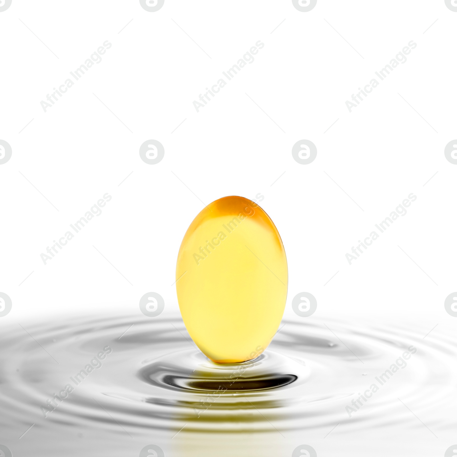 Image of Fish oil capsule in water on white background. Omega-3 fatty acids