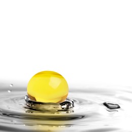 Image of Fish oil capsule in water on white background. Omega-3 fatty acids