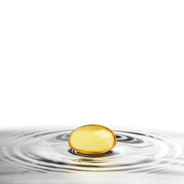 Image of Fish oil capsule in water on white background. Omega-3 fatty acids