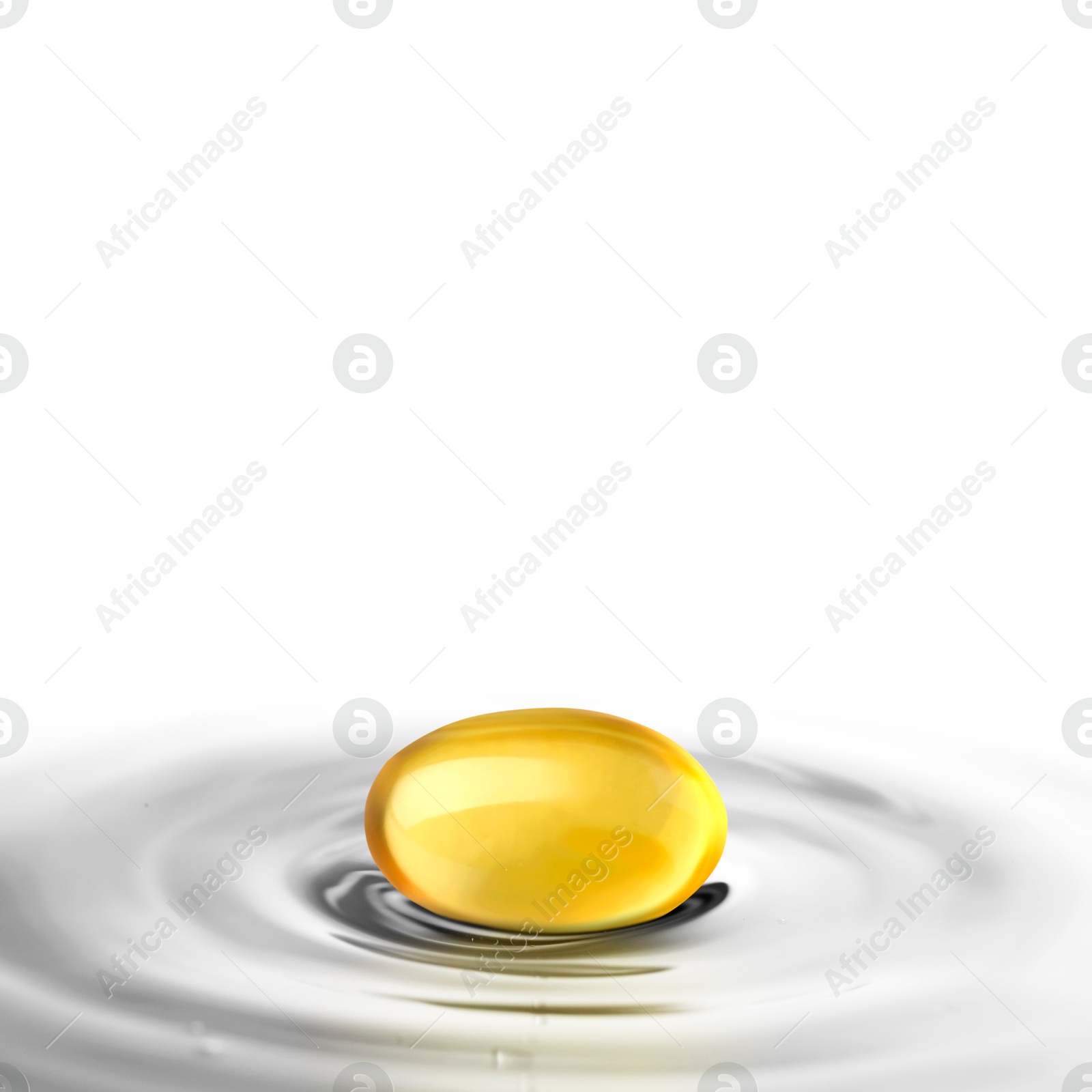 Image of Fish oil capsule in water on white background. Omega-3 fatty acids