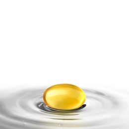 Image of Fish oil capsule in water on white background. Omega-3 fatty acids