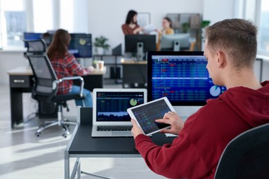 Stock exchange. Man working at desk in office