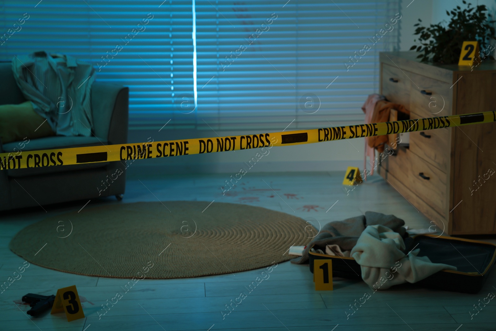 Photo of Yellow crime scene tape blocking way to messy room