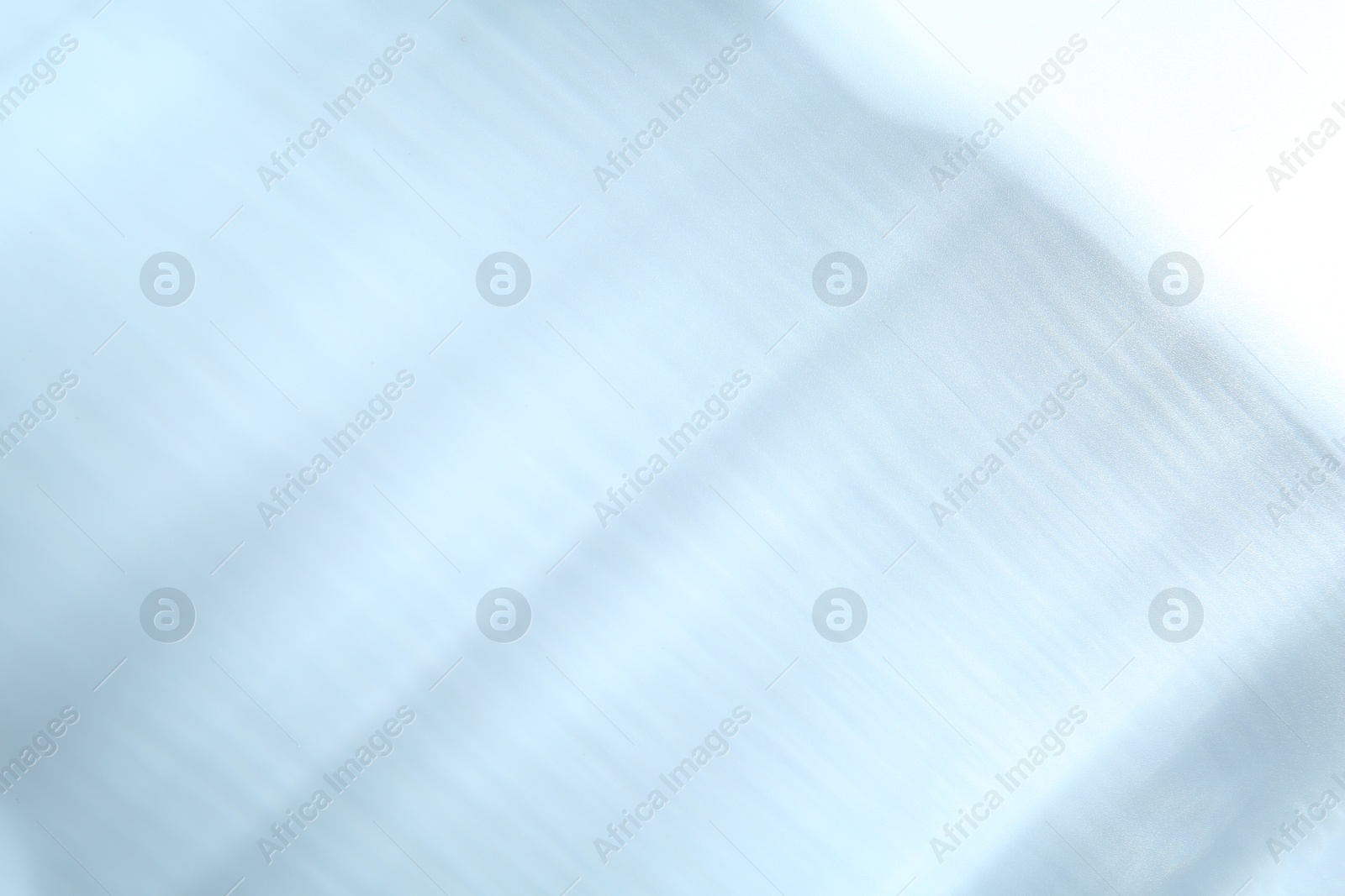 Photo of Light and shadows falling on white background