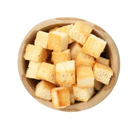 Photo of Delicious crispy croutons in bowl isolated on white, top view