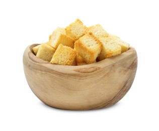 Photo of Delicious crispy croutons in bowl isolated on white