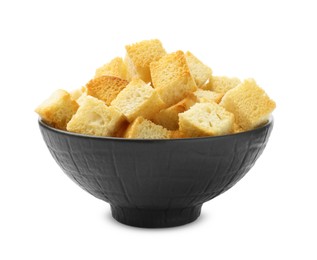 Photo of Delicious crispy croutons in bowl isolated on white