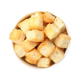 Photo of Delicious crispy croutons in bowl isolated on white, top view