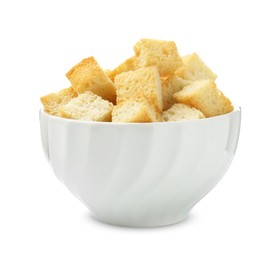 Photo of Delicious crispy croutons in bowl isolated on white