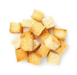 Photo of Many delicious crispy croutons isolated on white, top view