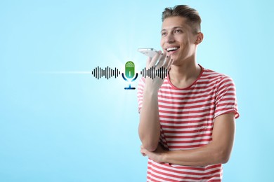 Young man recording voice message via smartphone on light blue background. Illustration of microphone and sound waves