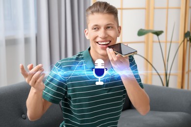 Young man recording voice message via smartphone at home. Illustration of microphone and sound waves