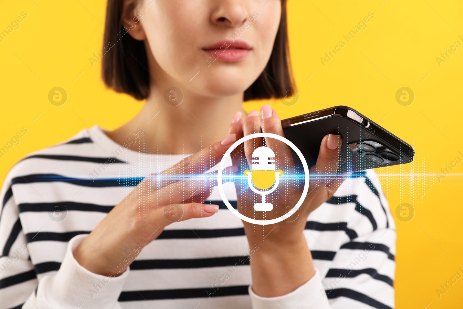 Image of Young woman recording voice message via smartphone on yellow background, closeup. Illustration of microphone and sound waves