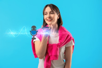 Image of Young woman recording voice message via smartphone on light blue background. Illustration of microphone and sound waves