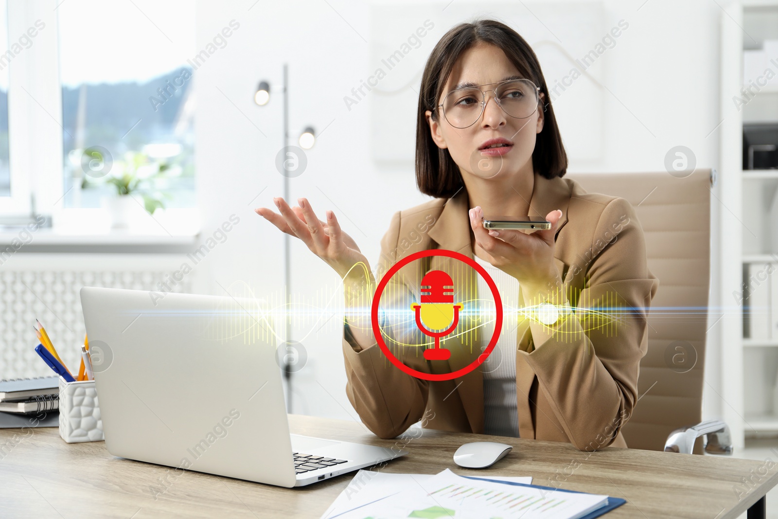 Image of Young woman recording voice message via smartphone in office. Illustration of microphone and sound waves