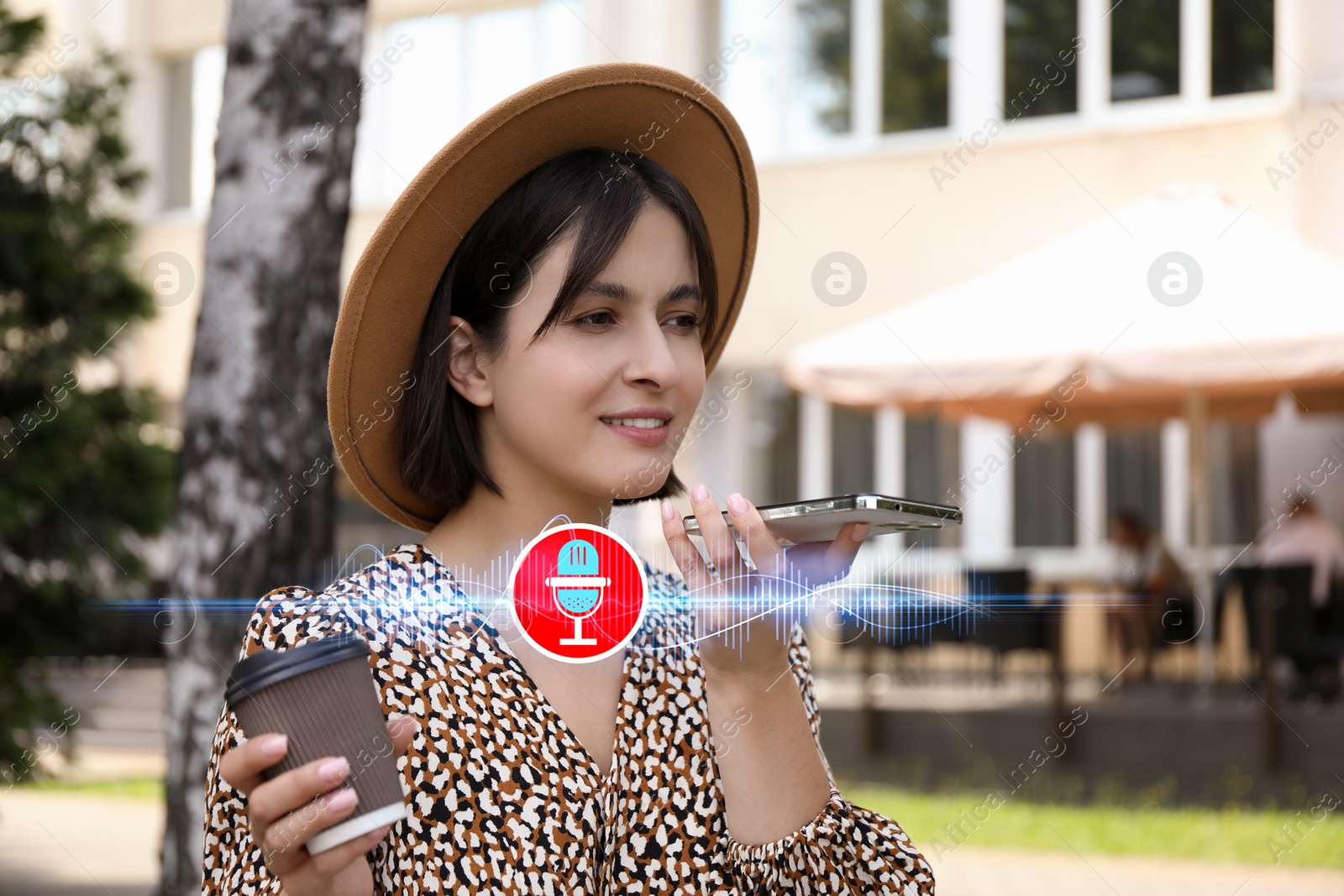 Image of Young woman recording voice message via smartphone outdoors. Illustration of microphone and sound waves