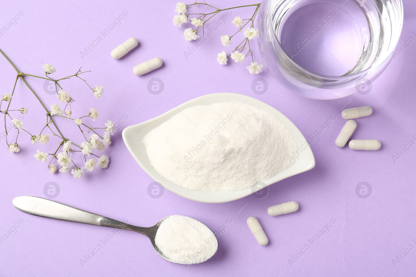 Collagen powder in bowl, spoon, pills, glass of water and gypsophila flowers on violet background, flat lay Photo of Collagen powder in bowl, spoon, pills, glass of water and gypsophila flowers on violet background, flat lay