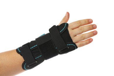 Photo of Injured woman with wrist brace on white background, closeup