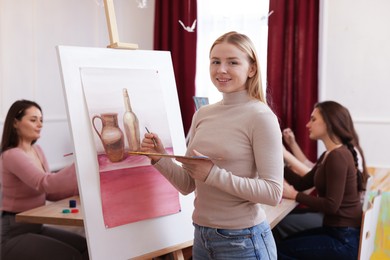 Photo of Group of women learning to draw in class