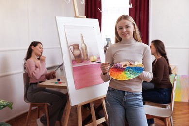 Photo of Group of women learning to draw in class