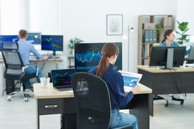 Photo of Stock exchange. Business team working in office, selective focus