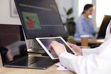 Photo of Stock exchange. Woman working at desk in office, closeup