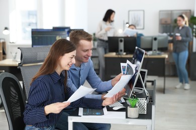 Photo of Stock exchange. Colleagues working together in office