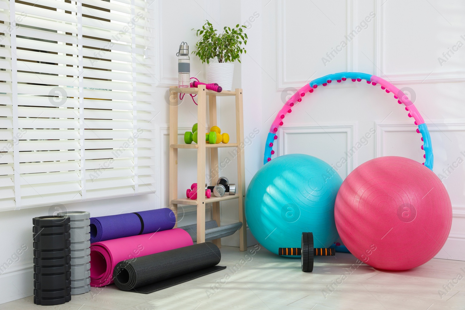 Many different fitness equipment and accessories indoors Photo of Many different fitness equipment and accessories indoors