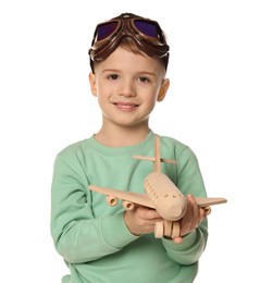 Photo of Happy little boy with toy plane on white background