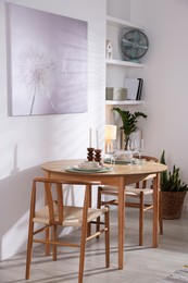 Photo of Stylish table setting and chairs in dining room. interior design