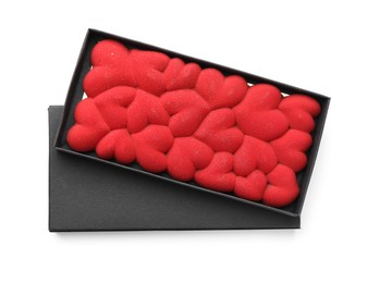 Photo of Chocolate bar decorated with hearts in box isolated on white, top view