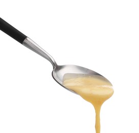 Photo of Delicious melted cheese flowing down from spoon isolated on white
