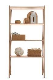 Photo of Wooden shelving unit with different home decor isolated on white