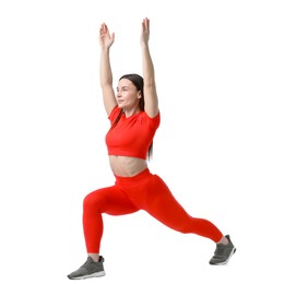 Photo of Woman in sportswear exercising on white background